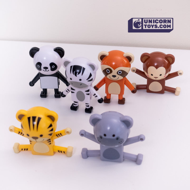 Set of animal-themed figurines on a white background with 'Unicorn Toys.com' logo.
